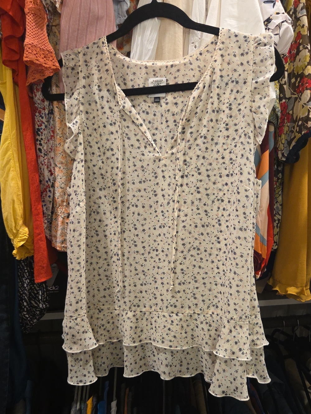 CAbi Cream Blouse with Navy Floral Print and Ruffle Hem